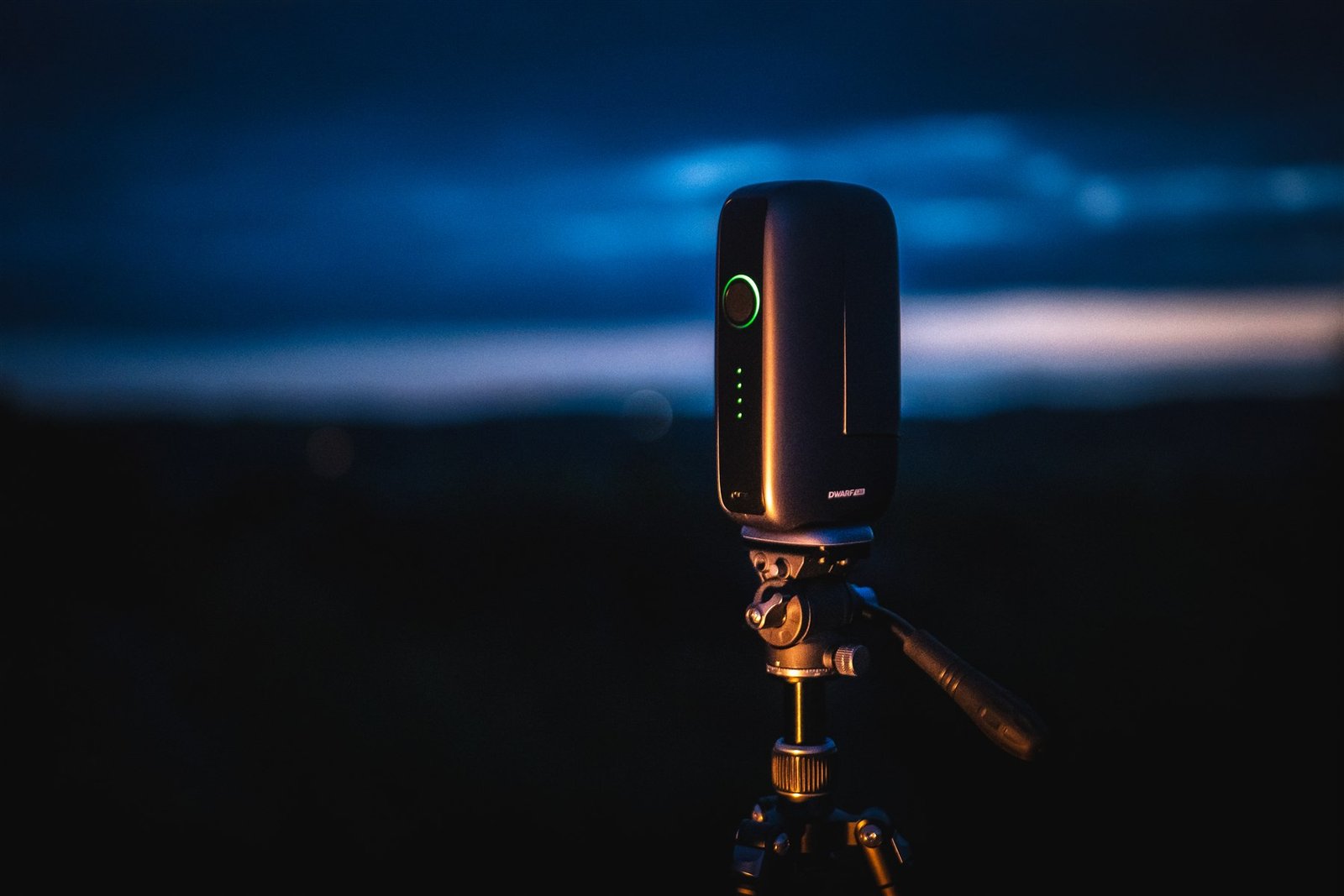 The DWARFLAB DWARF Mini smart telescope on its tripod outdoors at dusk