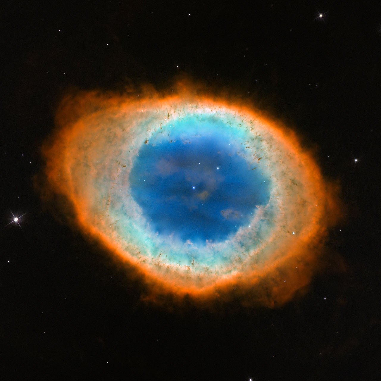 The Ring Nebula (M57), a planetary nebula in Lyra showing a glowing ring of gas around a dying star