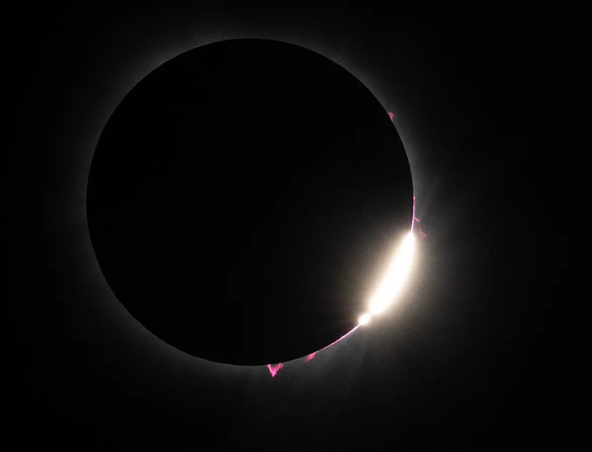 Total solar eclipse showing the corona and solar prominences, captured during the April 2024 eclipse