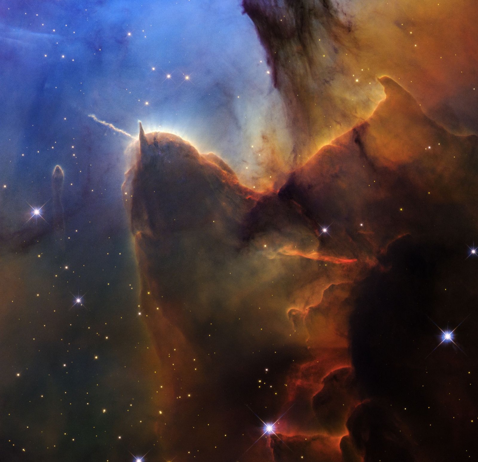 The Trifid Nebula in Sagittarius, showing its characteristic dark dust lanes and glowing gas
